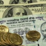 Rupee gains 12 paise to settle at 85.68 against U.S. dollar
