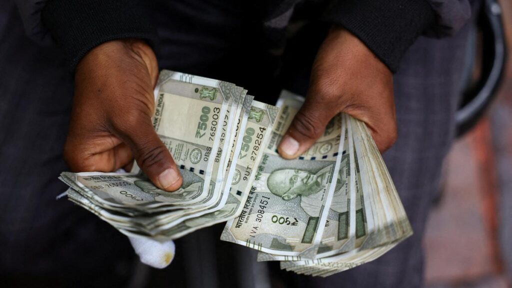 Rupee rises 20 paise to close at 95.58 against U.S. dollar