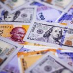 Rupee slumps 38 paise to close at 95.92 against U.S. dollar